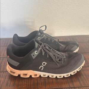 On Running Black and Peach Athletic Shoes